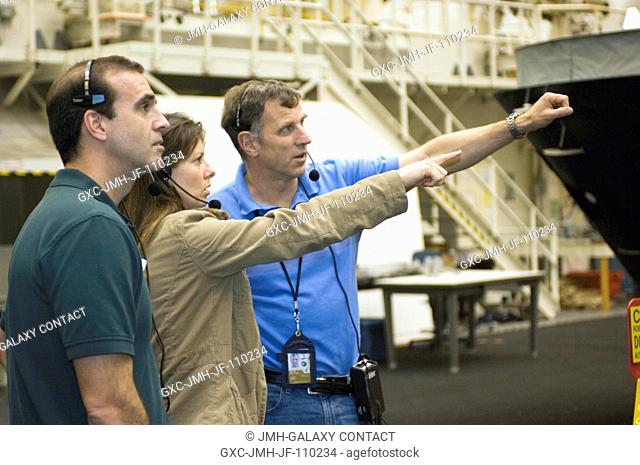 Astronauts Richard A. (Rick) Mastracchio (left), Tracy E. Caldwell and Canadian Space Agency astronaut Dafydd R. (Dave) Williams
