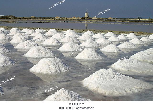 Saltworks on Sicily - salt extraction of sea water - salt pile with extracted salt