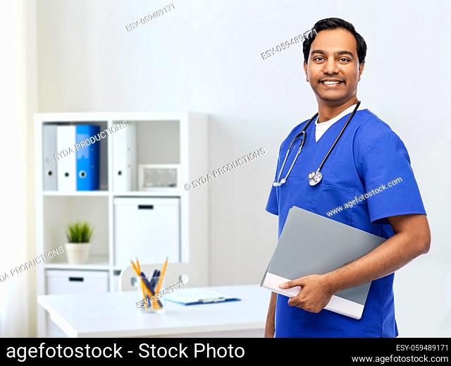 happy indian doctor with folder and stethoscope
