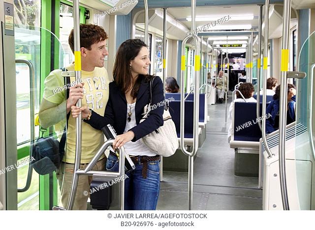 Young couple in tram, Vitoria, Alava, Basque Country, Spain