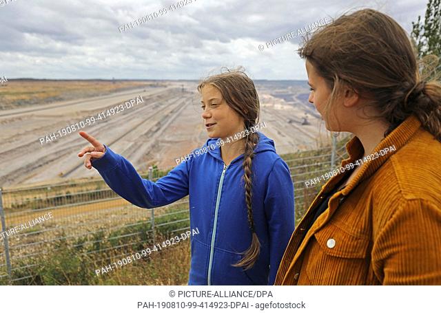 10 August 2019, North Rhine-Westphalia, Elsdorf: Greta Thunberg (l), climate protection activist, stands with Luisa Neubauer (r)