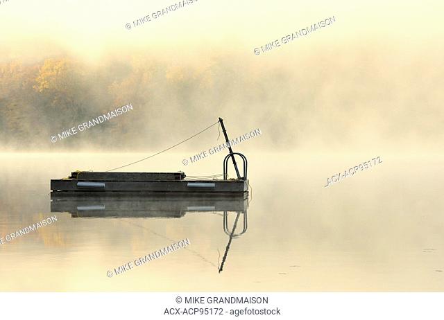 Dock in fog on Horseshoe Lake Horseshoe Lake Ontario Canada