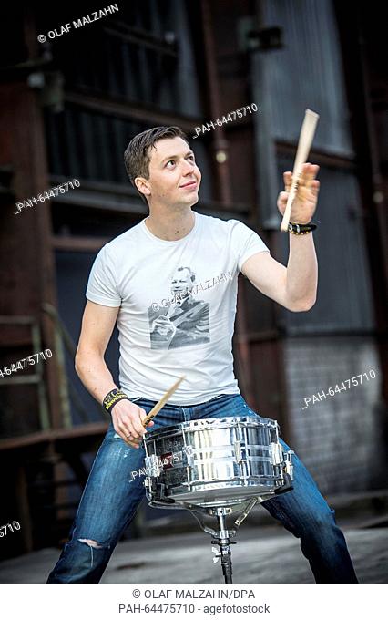 A file picture shows Austrian drummer and percussionist Martin Grubinger posing on the grounds of the 'Kunstwerk Carlshuette' (lit
