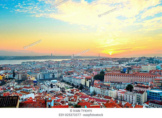 Overview of Lisbon city center and Tagus river at sunset, Portugal