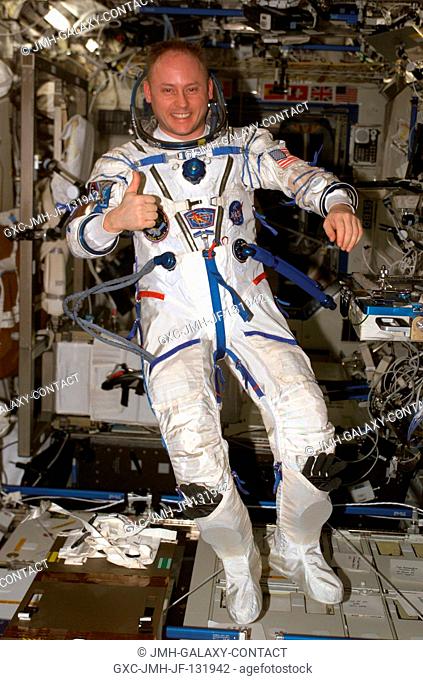 Astronaut Edward M. (Mike) Fincke, Expedition 9 NASA ISS science officer and flight engineer, wearing a Russian Sokol suit