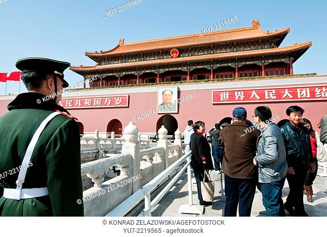 Chinese soldier stands at attention in front of Gate of Heavenly Peace (Tiananmen) in Beijing, China