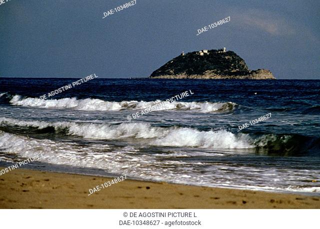Waves breaking on the beach in front of the Island of Gallinara, Liguria Region, Italy