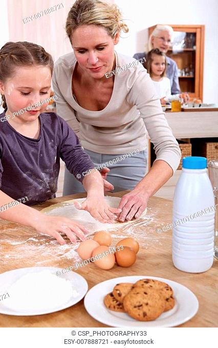 Mother baking with her daughter