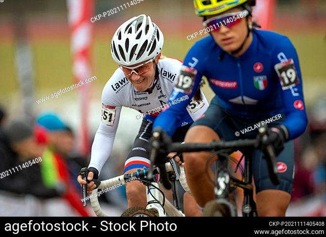 Pavla Havlikova (Czech), left, competes in women's elite category race of the UCI Cyclo-cross World Cup, on November 14, 2021, in Tabor, Czech Republic