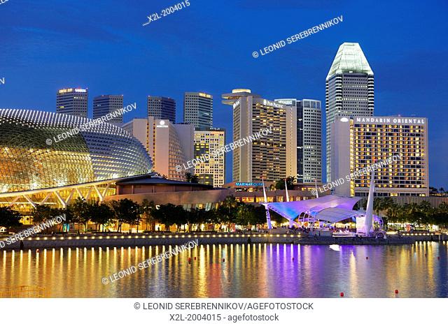 Esplanade Theaters with Suntec City skyscrapers at the background, Singapore