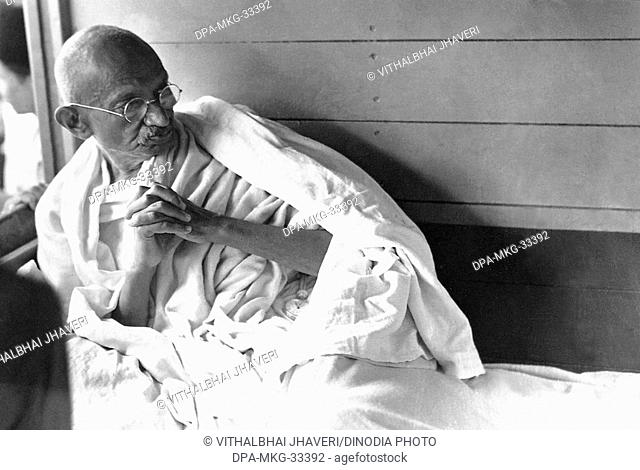 Mahatma Gandhi in a train during his Harijan Tour in Gujarat, India, July 1934 - MODEL RELEASE NOT AVAILABLE