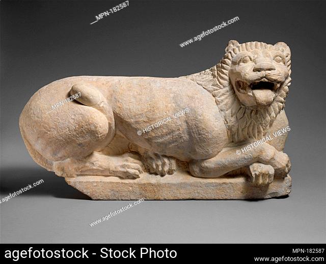 Limestone recumbant lion. Period: Cypro-Classical; Date: second half of the 5th century B.C; Culture: Cypriot; Medium: Limestone; Dimensions: Overall: 18 1/2 x...
