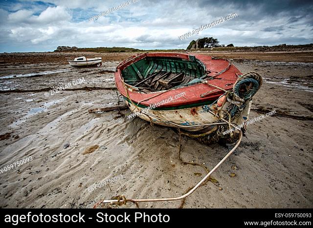 View of Old Boats in Brittany France on the shore during ebb tide