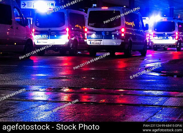 24 November 2023, Bremen: Bremen police emergency vehicles drive on a road. Photo: Sarah Knorr/dpa. - Bremen/Bremen/Germany