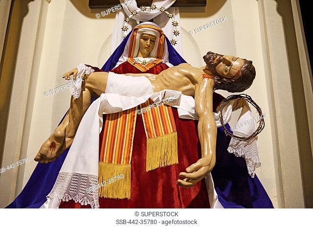Statue of Our Lady of Sorrows holding Jesus Christ, Church Of Sant Jaume, Barcelona, Catalonia, Spain