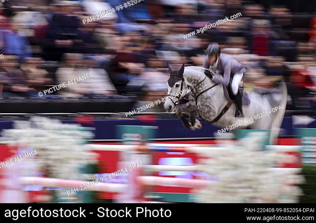 08 April 2022, Saxony, Leipzig: Christian Kukuk from Germany competes on Checker in the Final II of the Longines Fei Jumping World Cup at the Leipzig Fair
