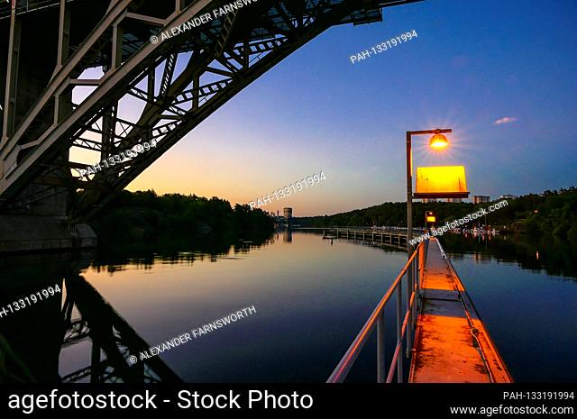 Stockholm, Sweden The Arsta bridge in the Liljeholmskajen neighborhood at dawn. | usage worldwide. - STOCKHOLM/Sweden