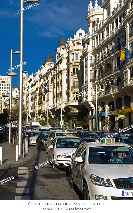 Traffic along Gran Via street central Madrid Spain Europe