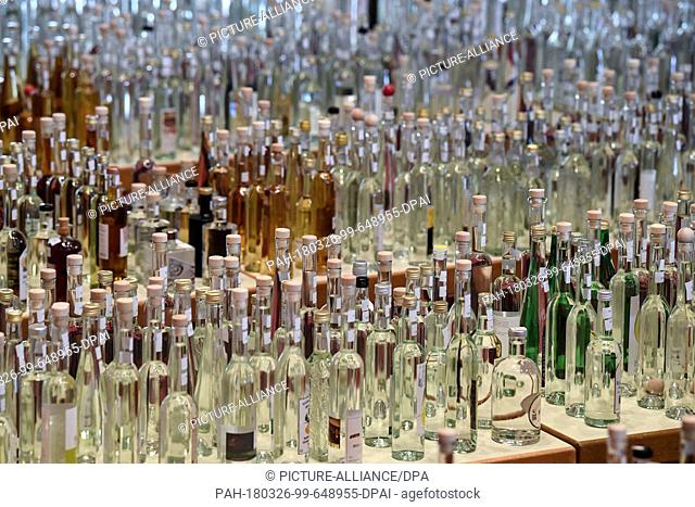 26 March 2018, Germany, Sasbachwalden: Hundreds of spirit bottles during a spirits award by the Association of Baden's small distillers and fruit distillers
