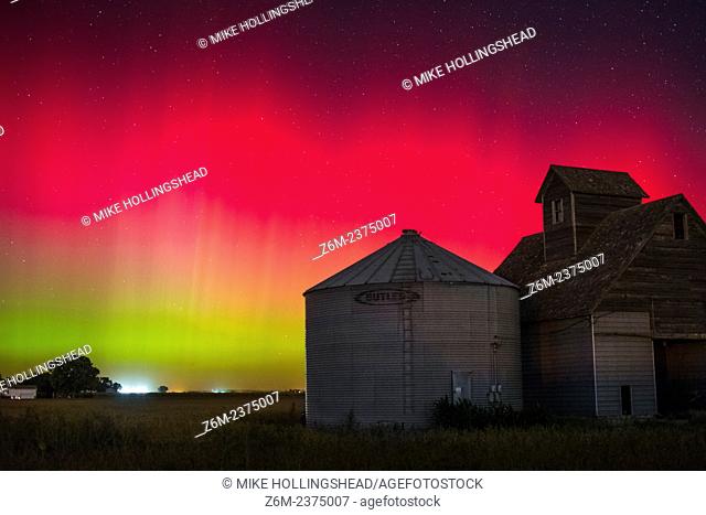 Bright red auroras dance over Iowa during a short but intense outburst of northern lights