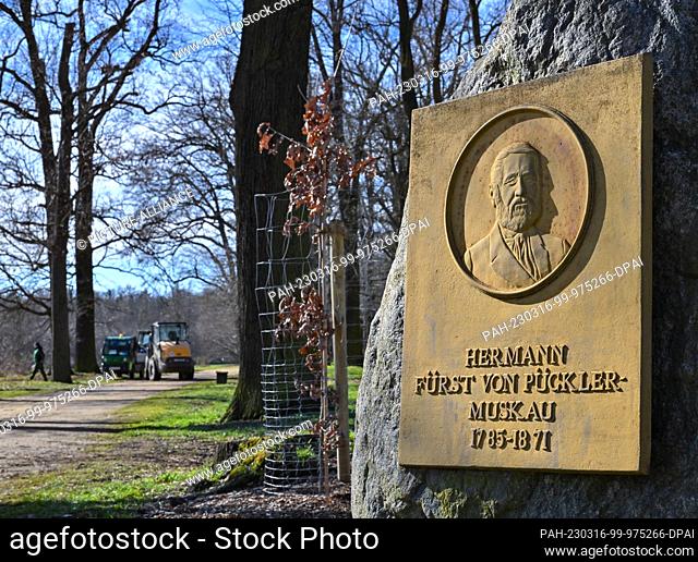 16 March 2023, Brandenburg, Cottbus: A relief with the portrait of Hermann Fürst von Pückler-Muskau (1785-1871) adorns a metal plate at the entrance to the park...