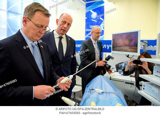 Prime Minister of Thuringia Bodo Ramelow (Die Linke, l) and Minister for Economic Affairs Wolfgang Tiefensee (SPD, c) visiting a practice hall for surgeries at...