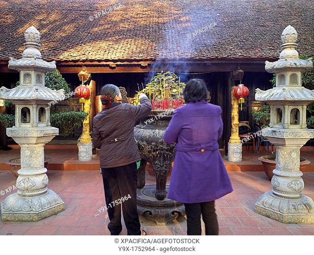 Locals worshipping at the Tran Quoc Pagoda