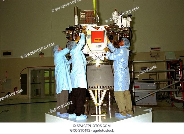 07/02/1997 --- Workers from the Johns Hopkins University’s Applied Physics Laboratory APL install the Cosmic Ray Isotope Spectrometer CRIS on the Advanced...
