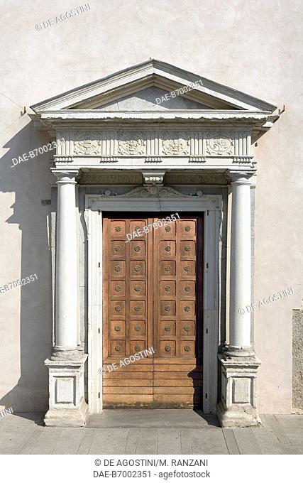 Door with architrave, by Giovanni and Girolamo del Marchese, 1586, facade of the Collegiate church of St Stephen, Vimercate, Lombardy, Italy, 11th-12th century
