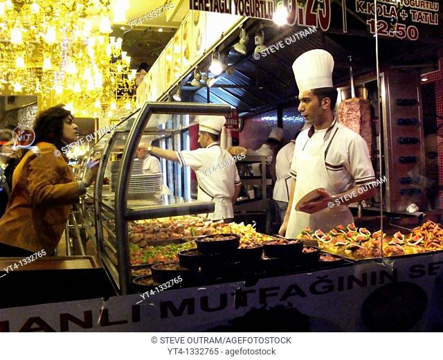 The city that never sleeps  Choosing Food at a Istiklal Street Restaurant Counter, Beyoglu, Istanbul, Turkey