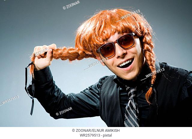 Funny man with red hair wig