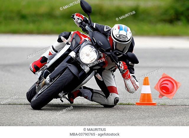 Motorcycle, MV Agusta Brutale 675 tripistoni, proving ground, curve around pylons