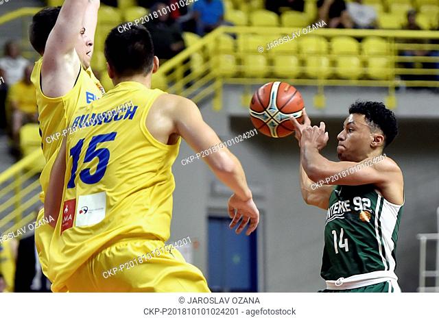 (L-R) Radovan Kouril and Vaclav Bujnoch of Brno and Armand Mensah of Nanterre in action during the Men's Basketball Champions League group B first round game...