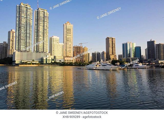 Avenue Balboa buildings reflecting in Panama Bay, Panama City, Panama
