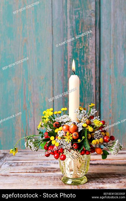 Florist at work: How to make autumn candle holder decorated with rose hip, hawthorn berries and tansy. Step by step, tutorial