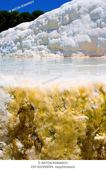 Pamukkale Turkey. Cotton white mountains. National reserve and tourist attractions. Hot Springs