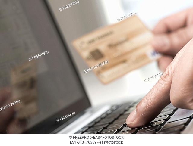 Man using tablet pc and credit card indoor, Shopping online