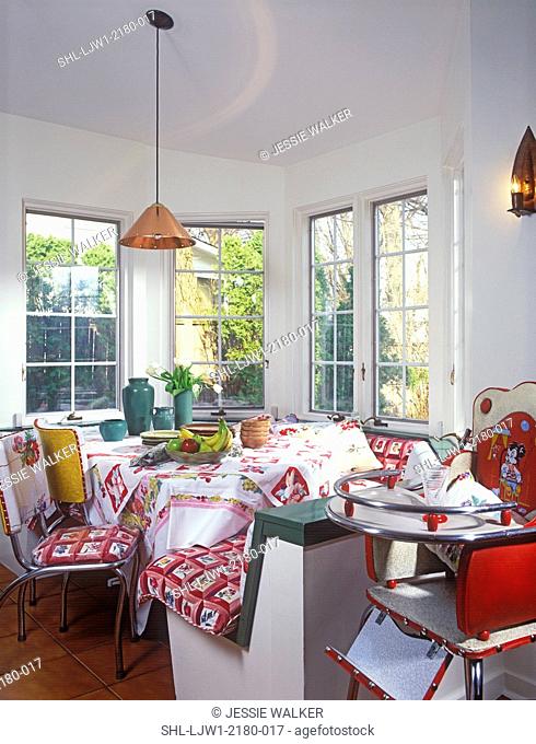 EATING AREAS: Built in benches in breakfast nook, vintage cloth upholstery, vintage 50's chrome and vinyl chairs, vintage tablecloths, green art pottery