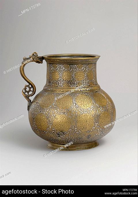 Dragon-Handled Jug with Inscription. Object Name: Ewer; Date: late 15th- first quarter 16th century; Geography: Attributed to present-day Afghanistan