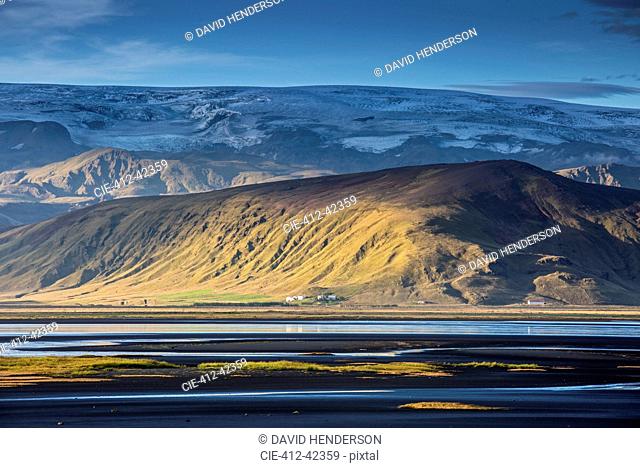 Scenic view of sunny remote landscape, Dyrholaey, Iceland
