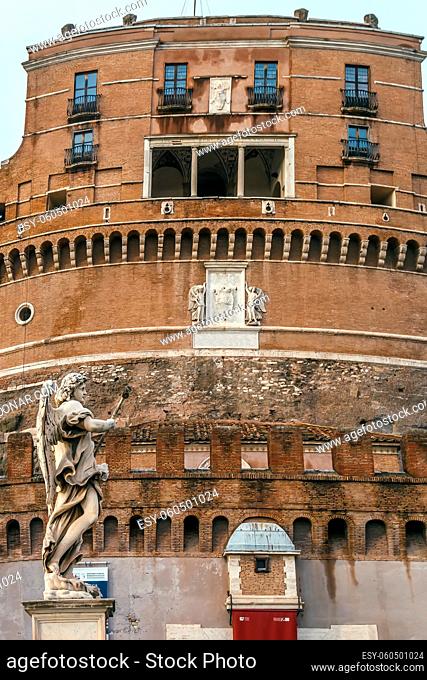 Mausoleum of Hadrian, usually known as Castel Sant'Angelo (Castle of the Holy Angel), is a towering cylindrical building in Parco Adriano, Rome, Italy