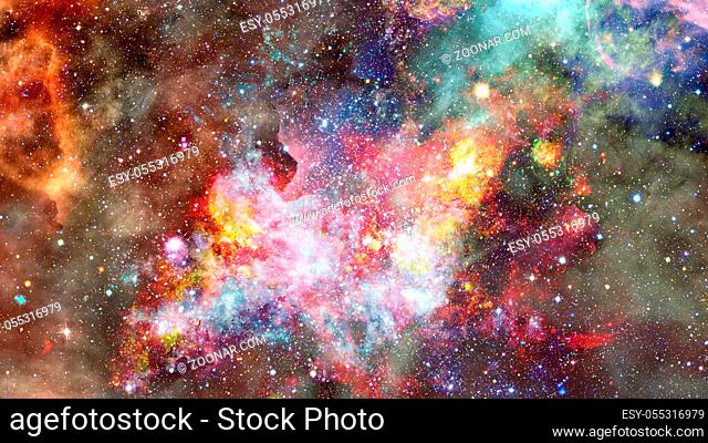 Colored clouds in nebula. Combined version of Hubble space telescope image. Elements of this image furnished by NASA