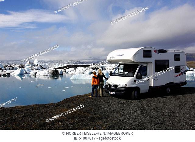 Woman and child and a camper van at a glacial lake, icebergs, glacier, Joekulsárlón, Iceland, Europe