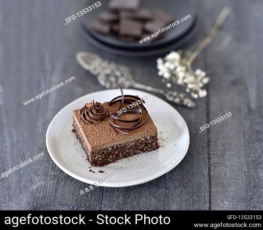 Vegan oatmeal brownie with creamy date chocolate icing