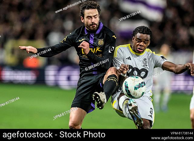 Anderlecht's Thomas Delaney and Standard's Nathan Ngoy fight for the ball during a Croky Cup 1/8 final match between RSC Anderlecht and Standard de Liege