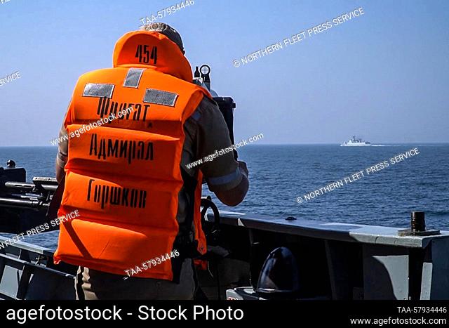 MARCH 18, 2023: Seen in this video screen grab is a crew member of the Russia Navy frigate Admiral Gorshkov during a joint naval drill in the Gulf of Oman