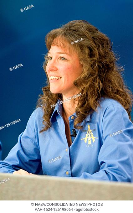 FILE: In this photo released by NASA, Astronaut Lisa M. Nowak, STS-121 mission specialist, listens to a reporter's question during the preflight press briefing...