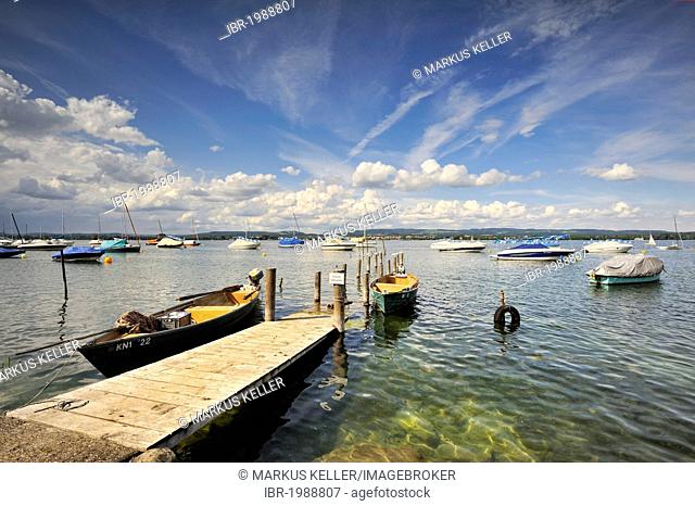 Fishing pier, fishing boats and yachts in the harbor of Iznang, Landkreis Konstanz county, Baden-Wuerttemberg, Germany, Europe