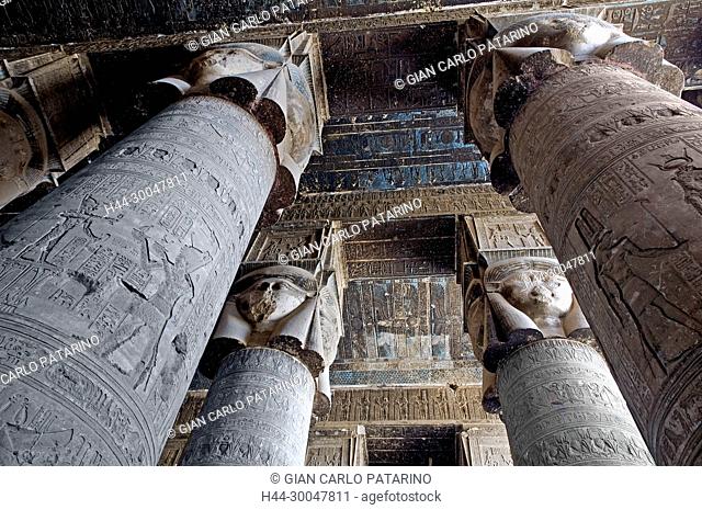 Dendera Egypt, temple dedicated to the goddess Hathor. View of ceiling and columns before cleaning