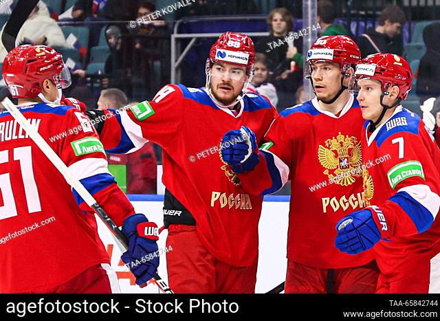 RUSSIA, ST PETERSBURG - DECEMBER 17, 2023: Russia 25's players celebrate scoring in their 2023 Channel One Cup ice hockey match against Kazakhstan at the Ledovy...